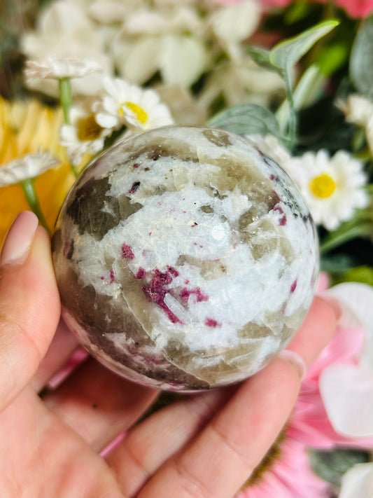 Pink tourmaline with smoky quartz sphere