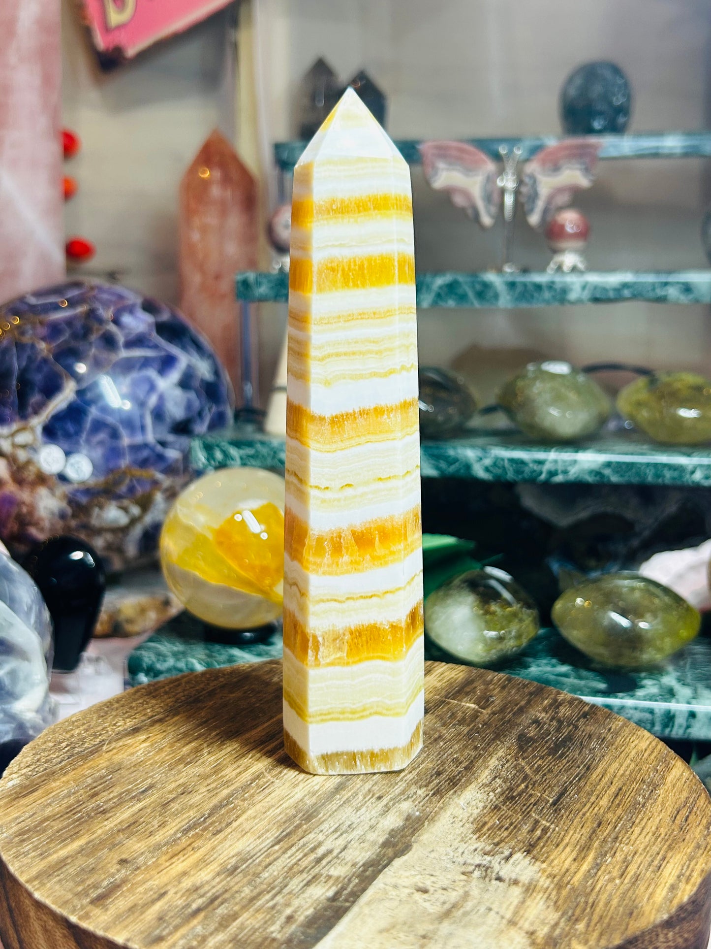 Orange calcite banded tower