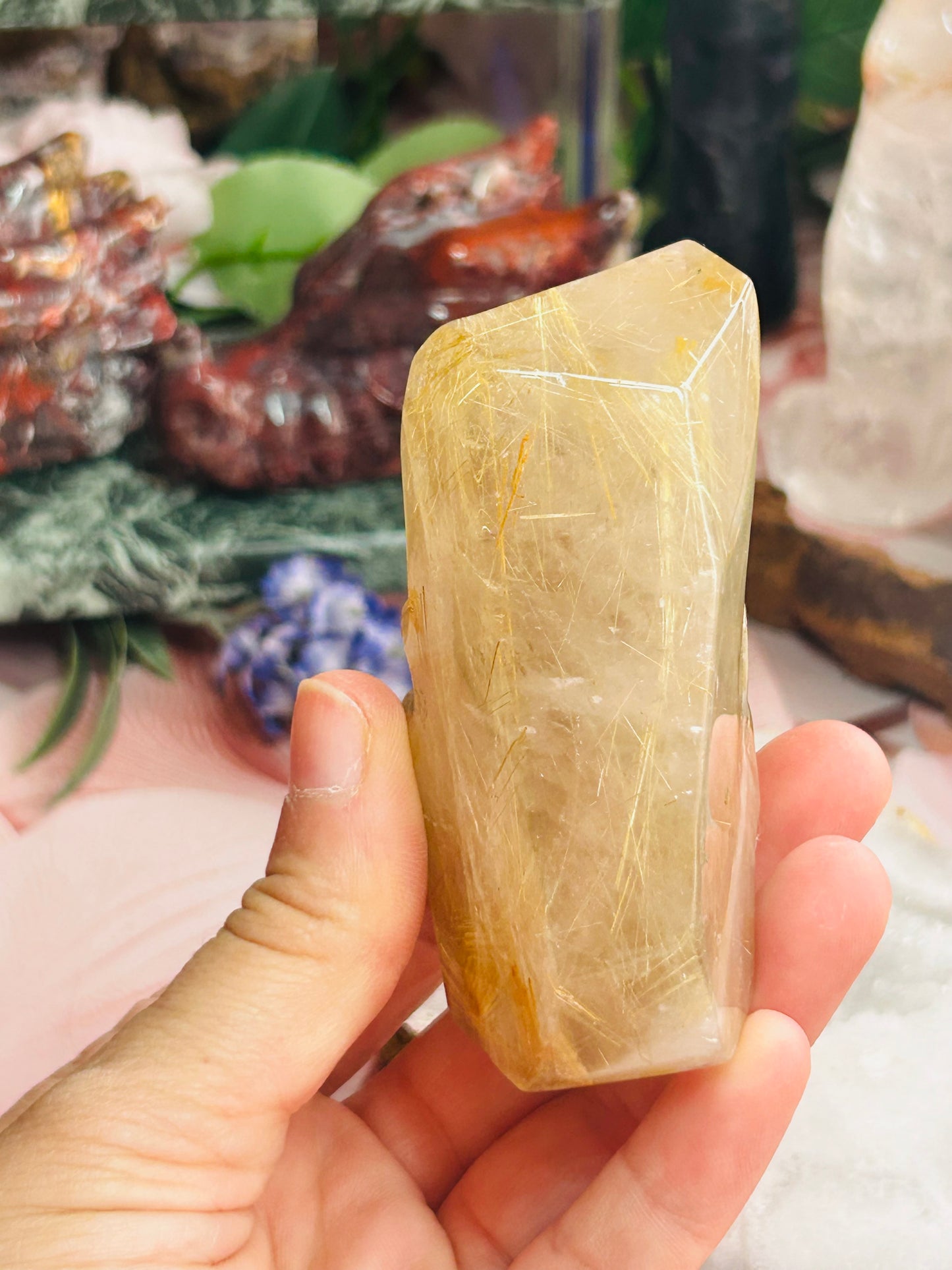 Gold rutilated quartz skull