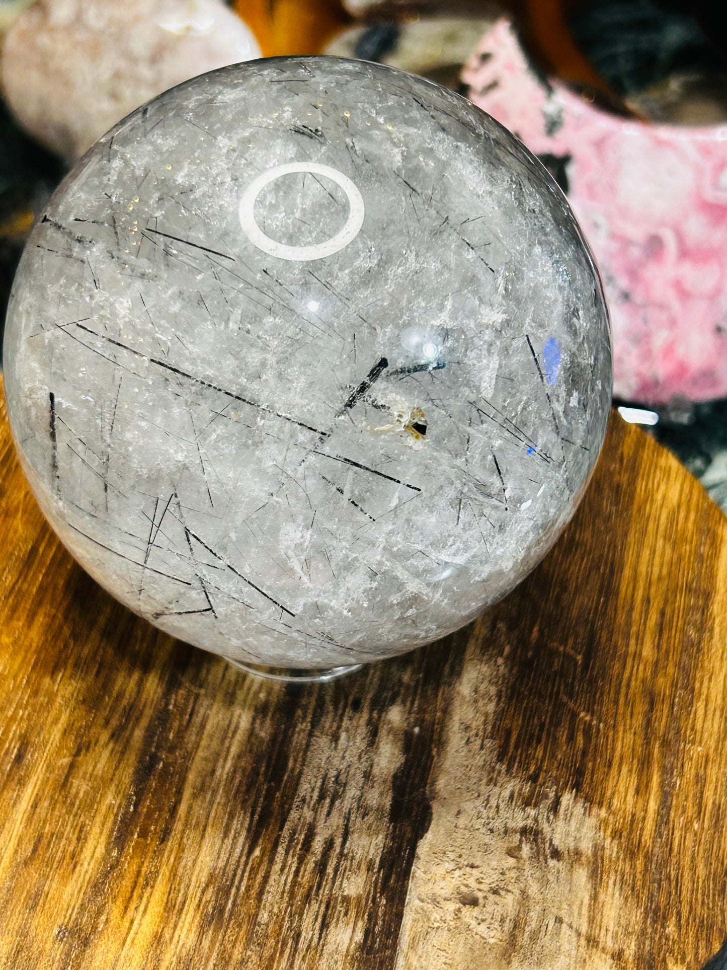 Black tourmaline in quartz sphere