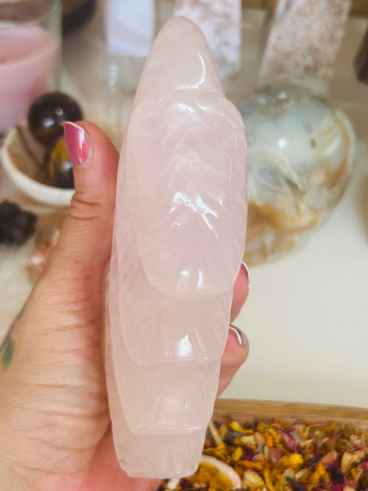 Rose quartz with golden healer eagle head