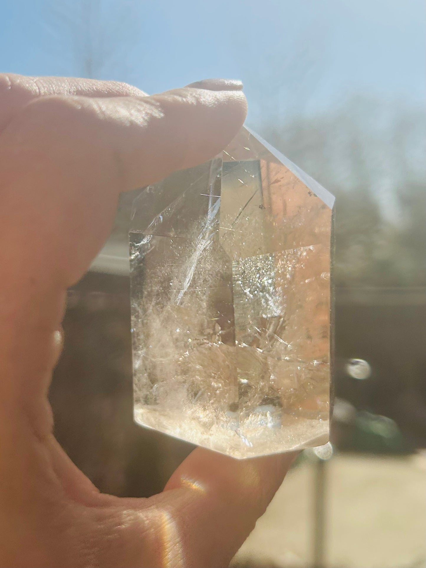 Smoky quartz tower with rutile