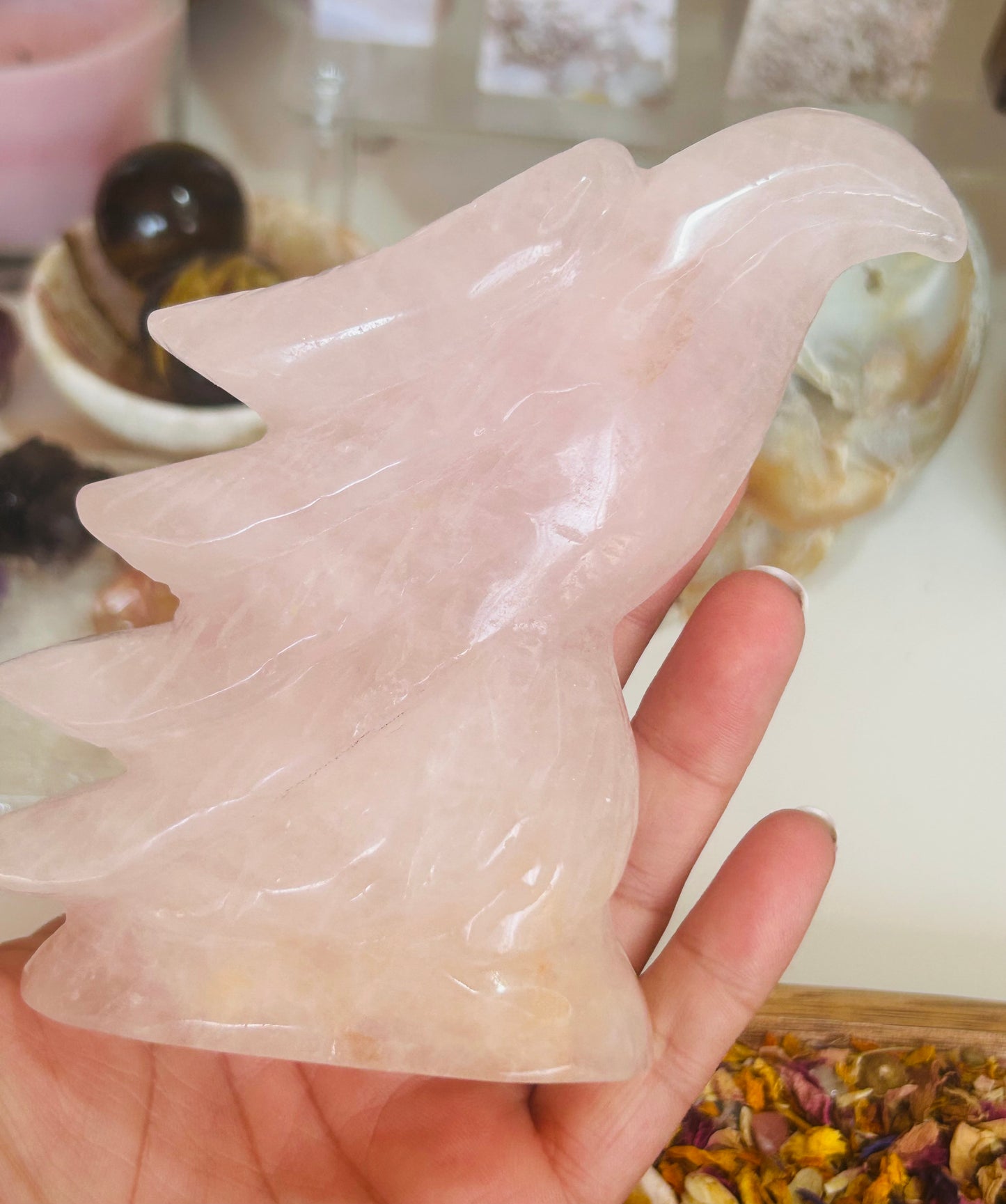 Rose quartz with golden healer eagle head