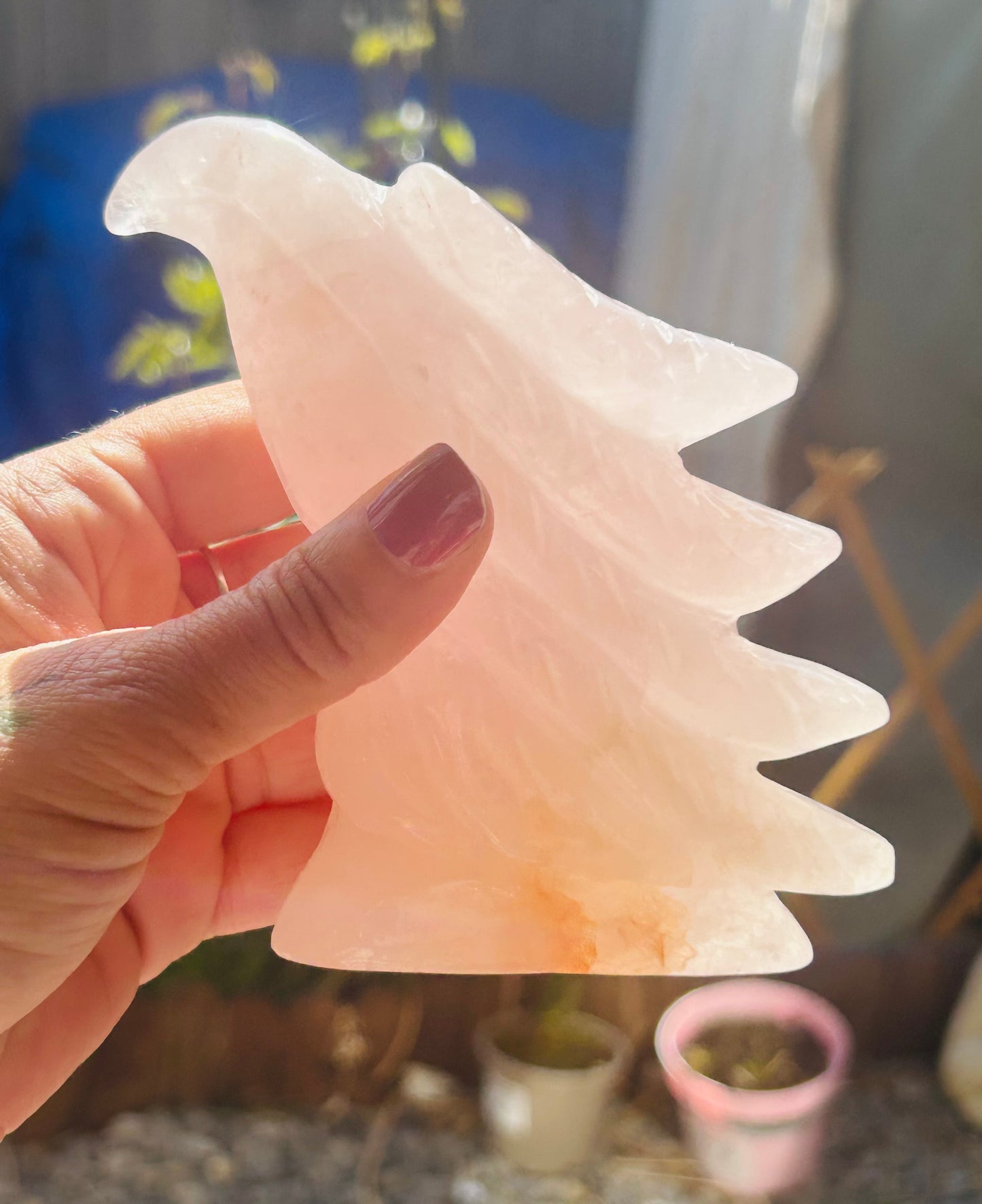 Rose quartz with golden healer eagle head