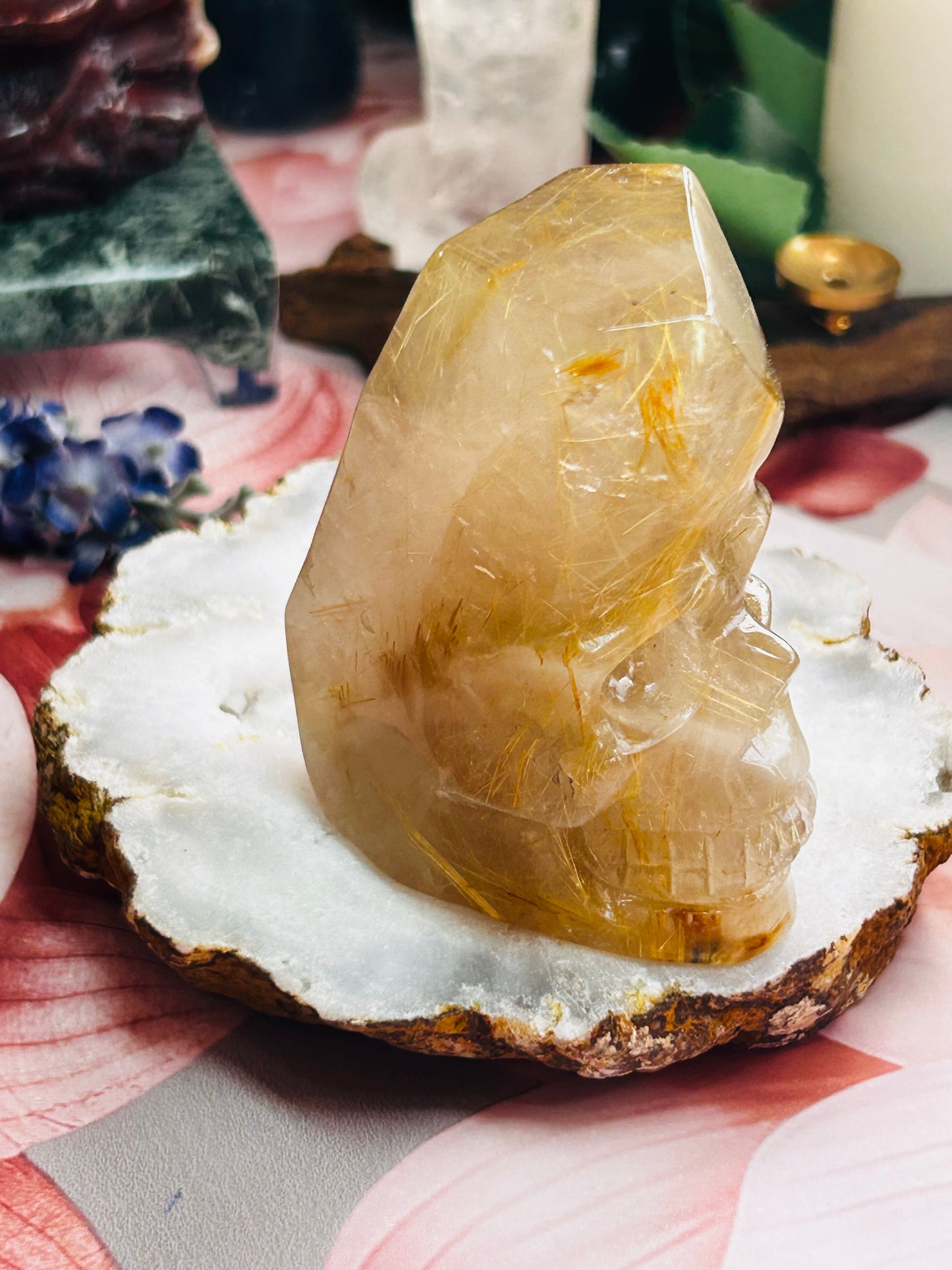 Gold rutilated quartz skull