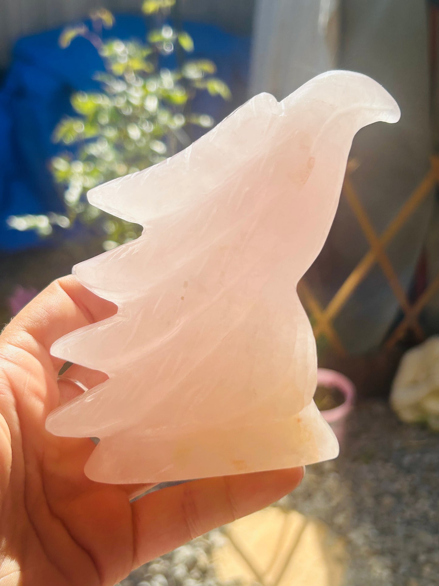 Rose quartz with golden healer eagle head