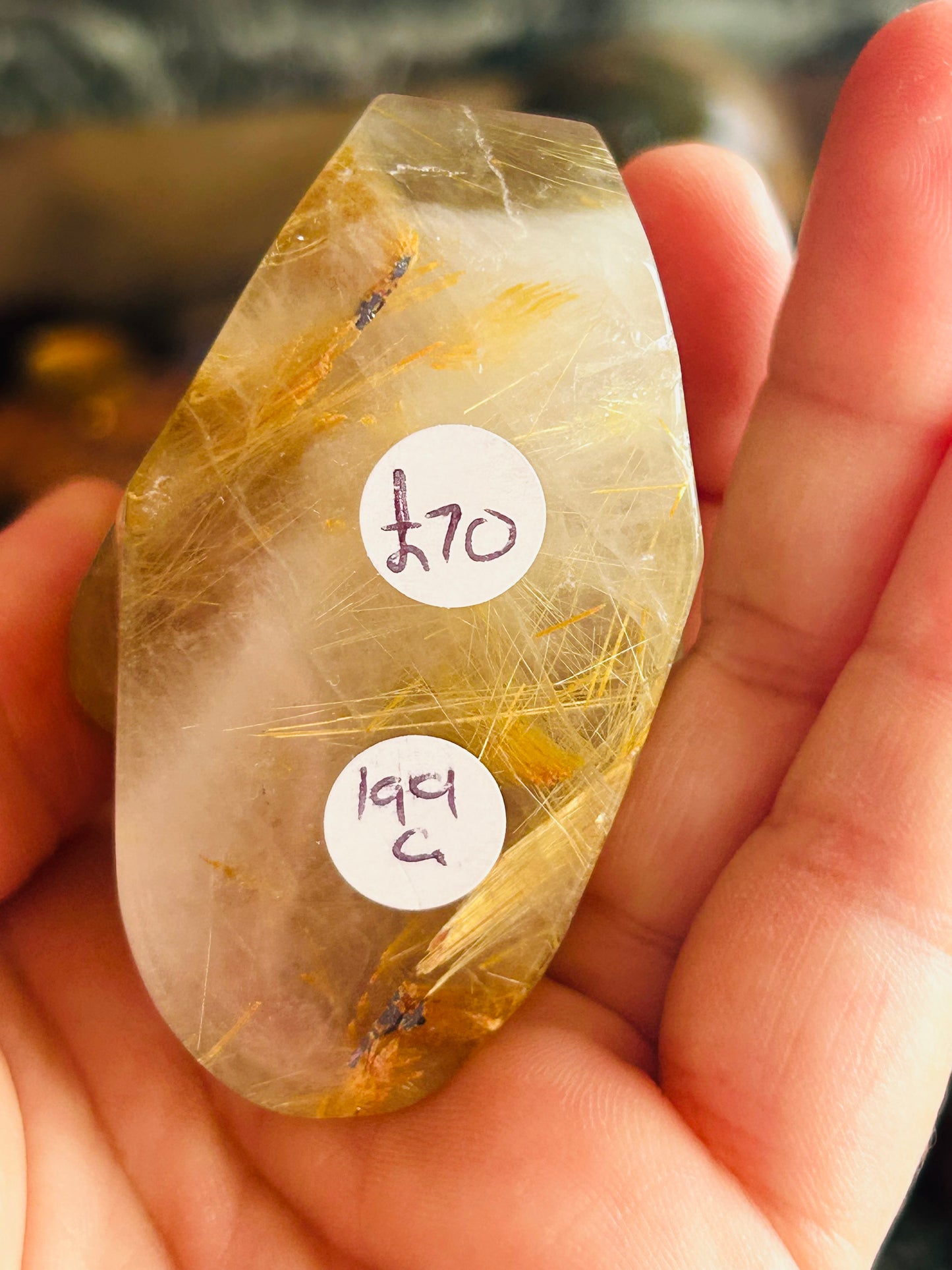 Gold rutilated quartz skull