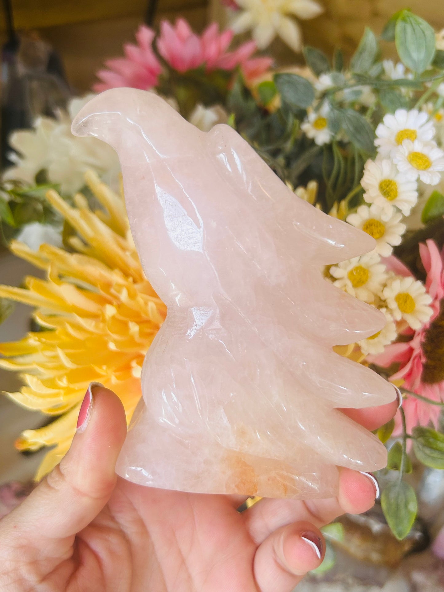 Rose quartz with golden healer eagle head