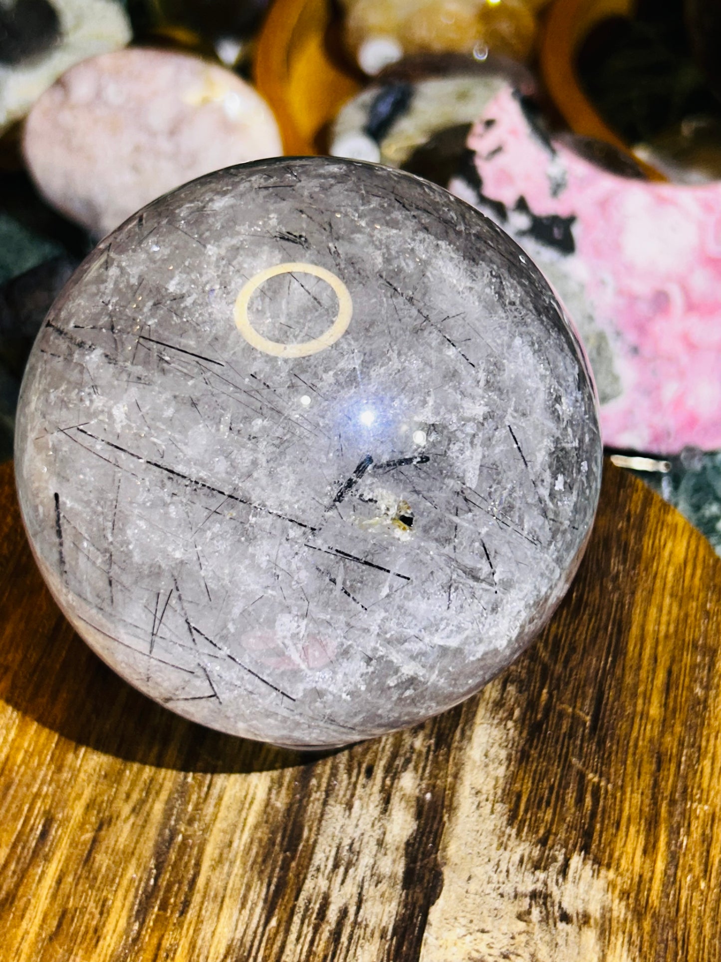 Black tourmaline in quartz sphere