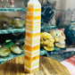 Orange calcite banded tower