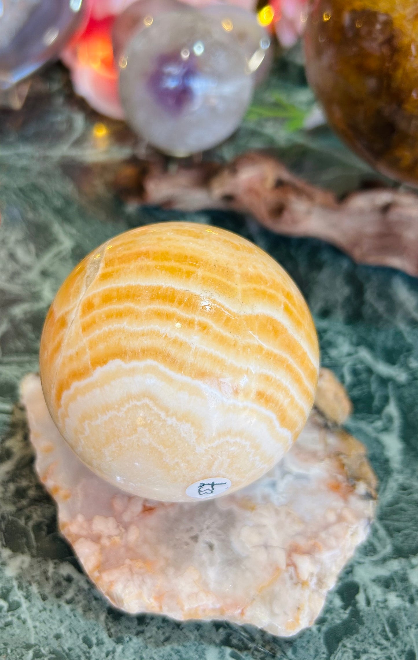 Orange calcite sphere