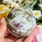 Pink tourmaline with smoky quartz sphere