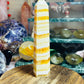 Orange calcite banded tower