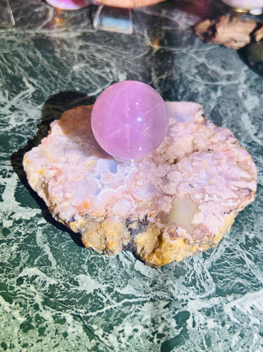 Asterism rose quartz sphere