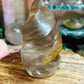Smoky quartz with golden healer flame