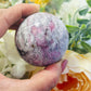 Pink tourmaline, smoky quartz and purple mica sphere