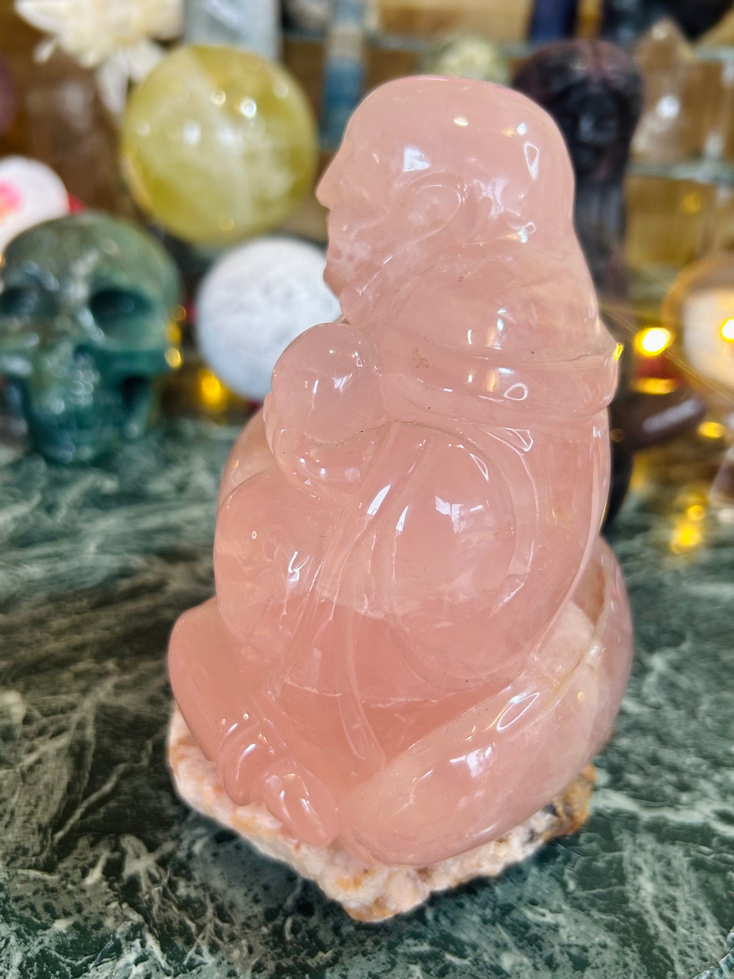 Rose quartz with flash Buddha