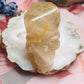 Gold rutilated quartz skull