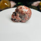 Rhodochrosite skull