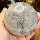 Black tourmaline in quartz sphere