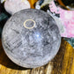 Black tourmaline in quartz sphere