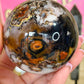 Sardonyx with flower agate sphere