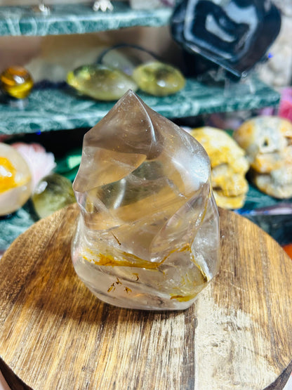 Smoky quartz with golden healer flame