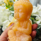 Orange calcite Buddha