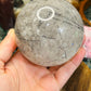 Black tourmaline in quartz sphere