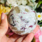 Pink tourmaline with smoky quartz sphere