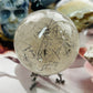 Smoky quartz with black tourmaline rutile sphere