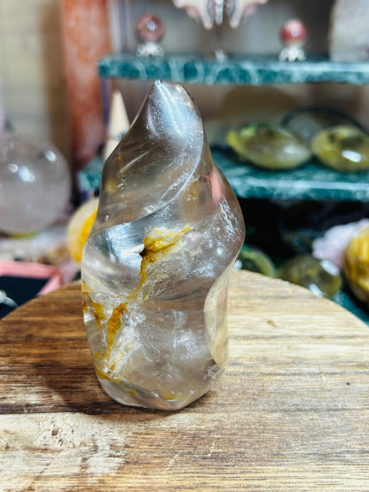 Smoky quartz with golden healer flame