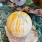 Orange calcite sphere
