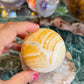 Orange calcite sphere