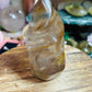 Smoky quartz with golden healer flame