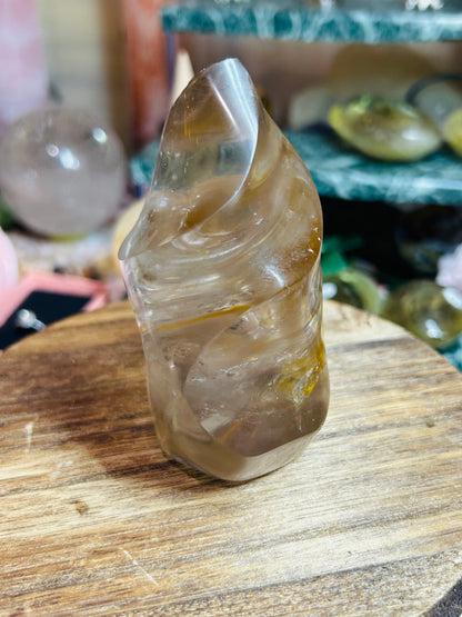 Smoky quartz with golden healer flame