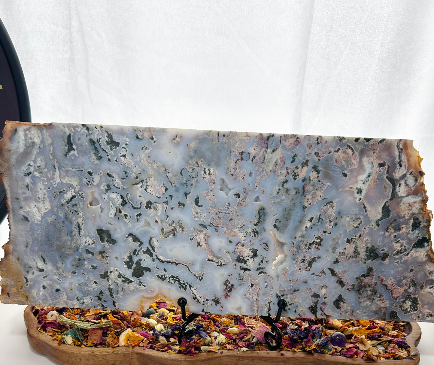 Pink moss agate slab with stand