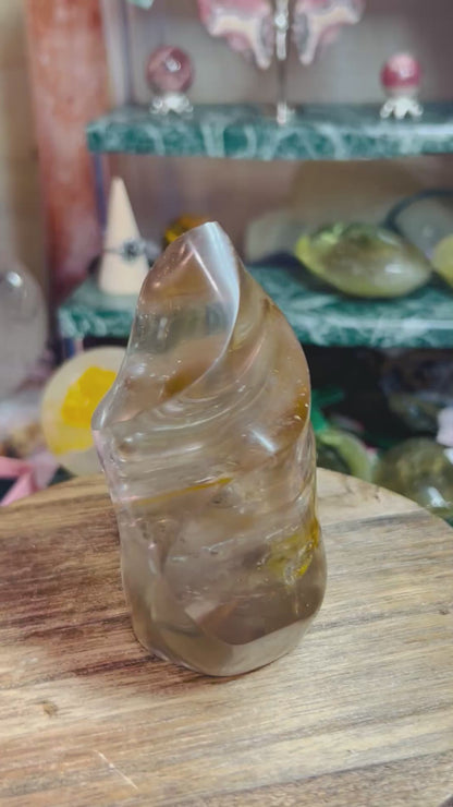 Smoky quartz with golden healer flame