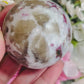 Pink tourmaline with smoky quartz sphere